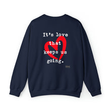 Load image into Gallery viewer, It&#39;s Love that Keeps Us Going - Graphic Print Unisex Heavy Blend™ Crewneck Sweatshirt