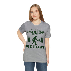 "Big Foot - Hide and Seek Champion" Custom Graphic Print Unisex Jersey Short Sleeve Tee